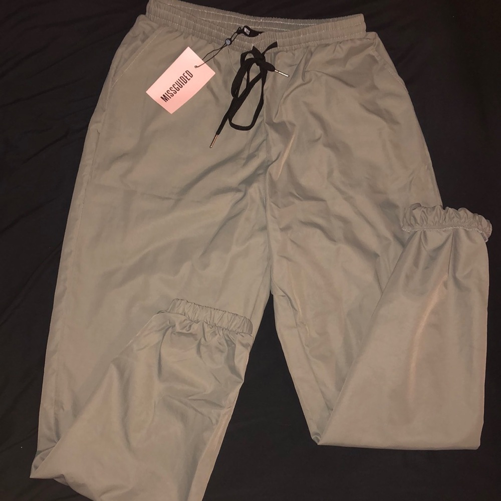 Grey track pants